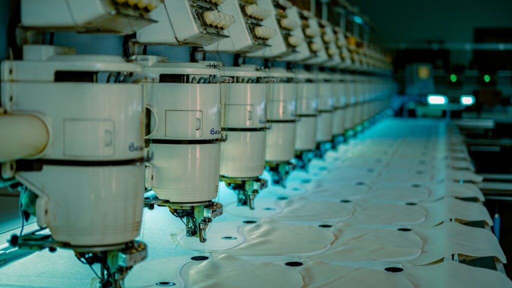 industrial sewing machines and bulk garment stitching line at Sheeny International factory